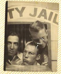 Emmet* Aldon West (center), "in jail"